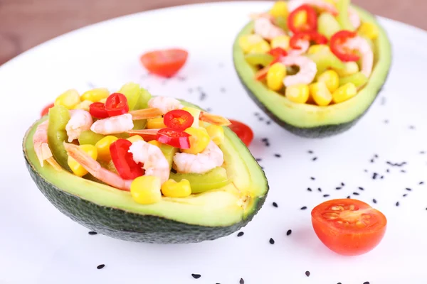 Tasty salad in avocado — Stock Photo, Image