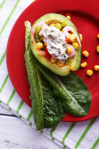 Tasty salad in avocado — Stock Photo, Image