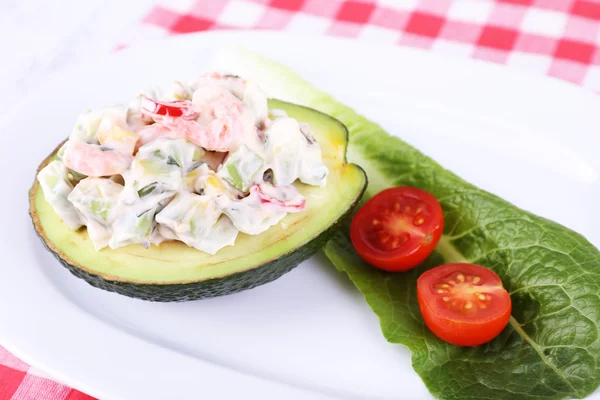 Tasty salad in avocado — Stock Photo, Image