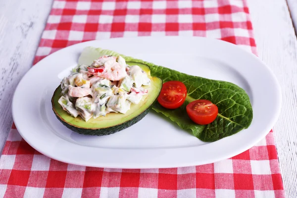 Tasty salad in avocado — Stock Photo, Image