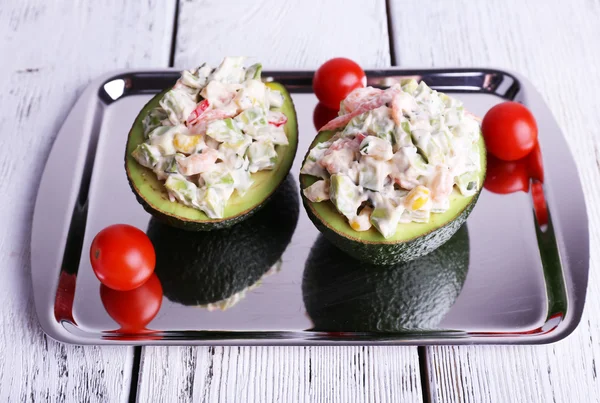 Tasty salad in avocado — Stock Photo, Image