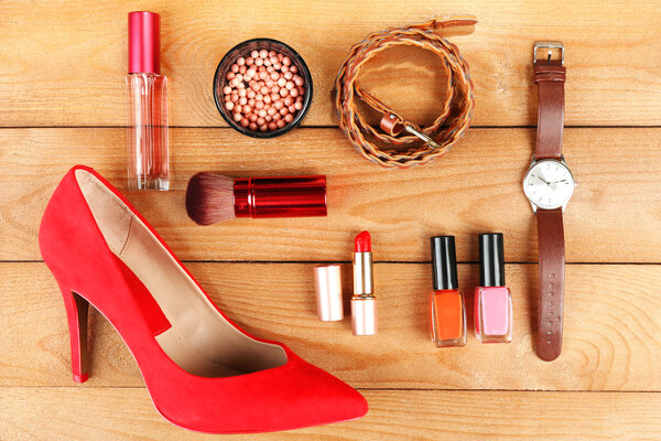 Essentials fashion woman objects on wooden background