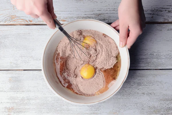 Mixing ingredients in bowl — Stock Photo, Image