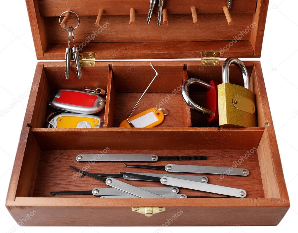 Keys and lock picks in wooden box