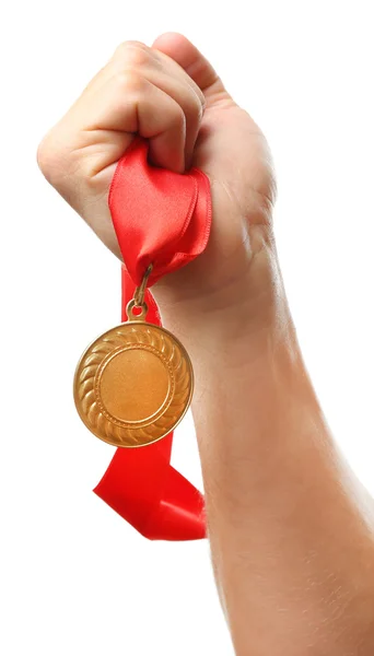 Golden medal in hand — Stock Photo, Image