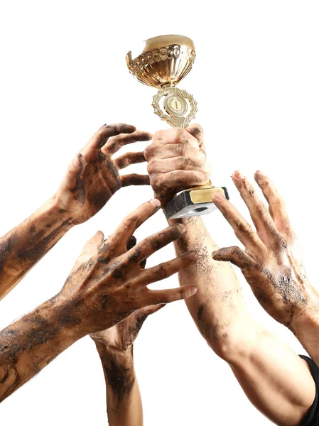 Copo de ouro nas mãos — Fotografia de Stock