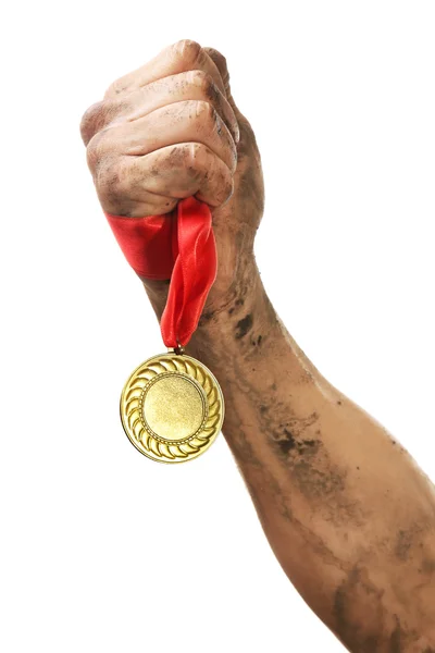 Golden medal in hand — Stock Photo, Image