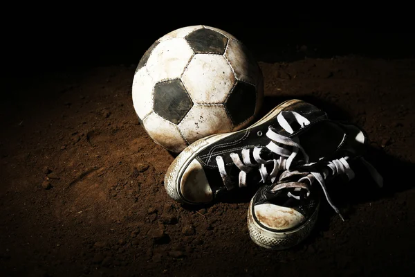 Soccer ball on ground — Stock Photo, Image