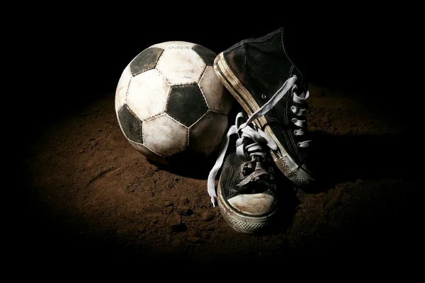 Soccer ball on ground — Stock Photo, Image