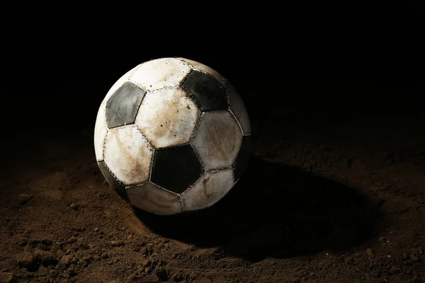 Bola de futebol no chão — Fotografia de Stock