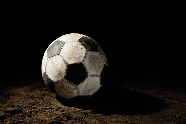 Bola de futebol no chão — Fotografia de Stock