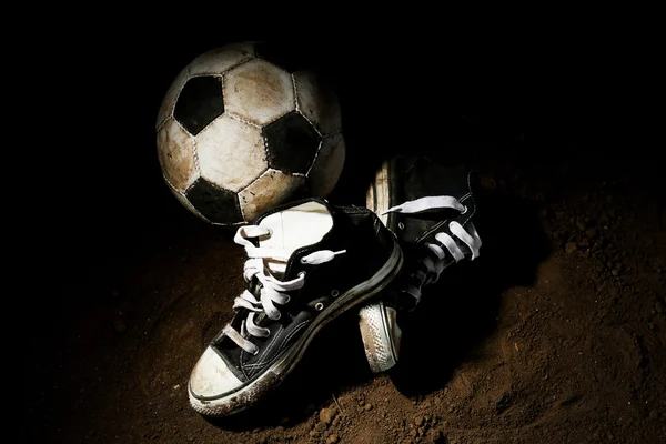 Soccer ball on ground — Stock Photo, Image