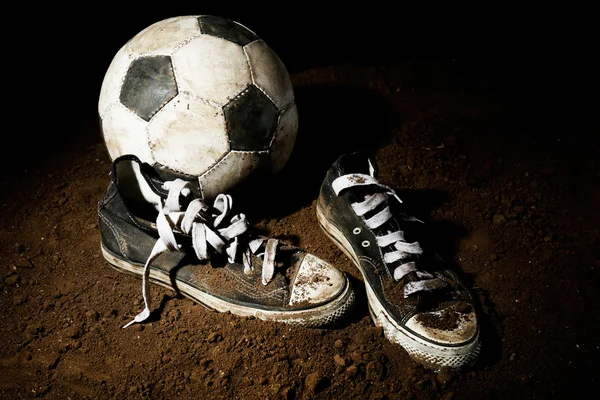 Soccer ball on ground — Stock Photo, Image