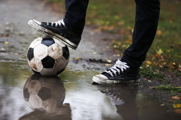 Soccer ball on ground — Stock Photo, Image