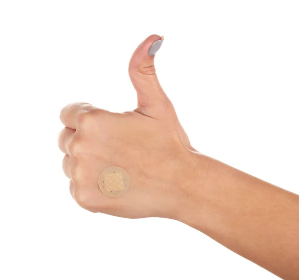 Wounded finger with plaster — Stock Photo, Image