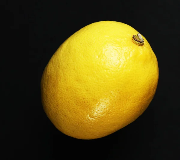 Lemon on black background — Stock Photo, Image