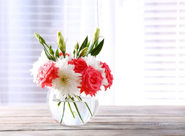 Beautiful flowers in vases — Stock Photo, Image