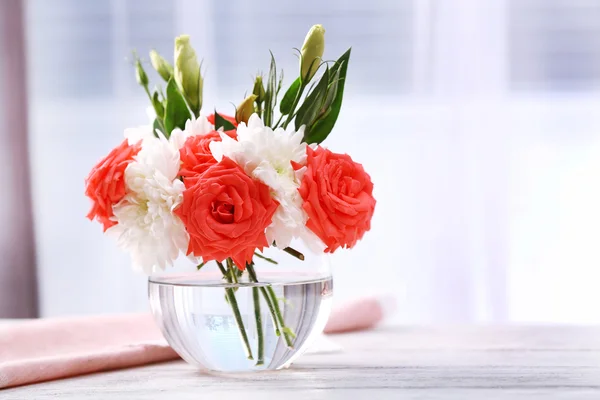 Beautiful flowers in vases — Stock Photo, Image