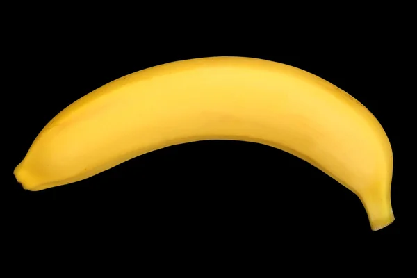 Банан на чорному фоні — стокове фото