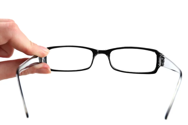 Eye glasses in human hand — Stock Photo, Image