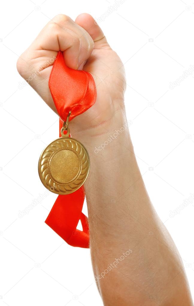 Golden medal in hand