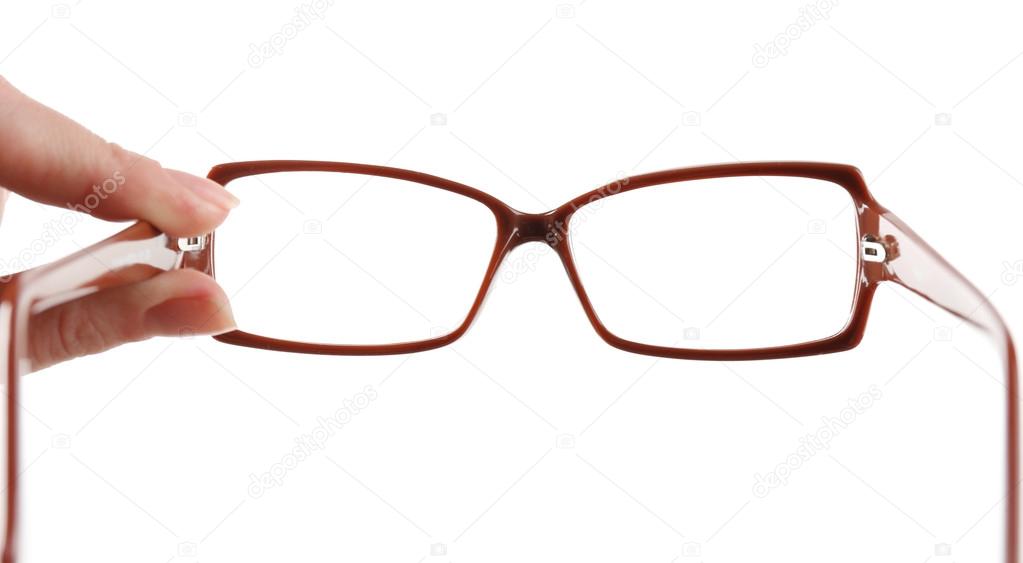 Eye glasses in human hand