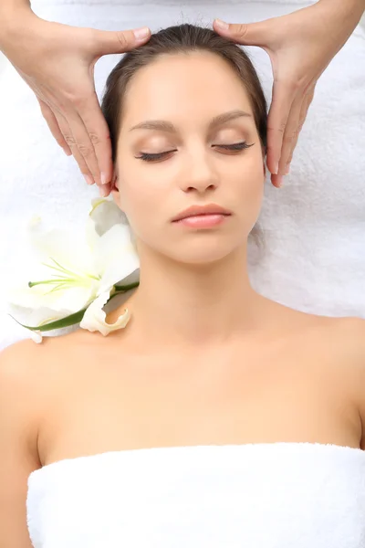 Woman taking head massage — Stock Photo, Image