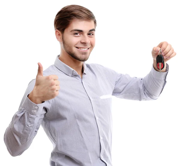 Businessman holding car key isolated on white — Stock Photo, Image