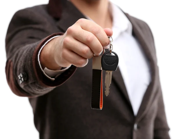 Empresário segurando chave do carro — Fotografia de Stock