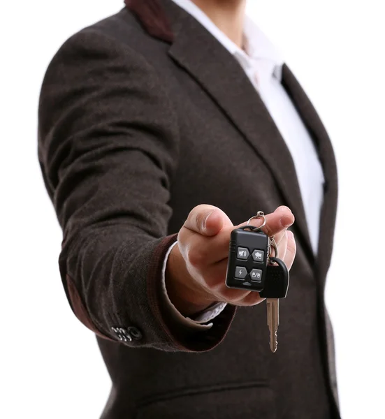 Empresário segurando chave do carro — Fotografia de Stock