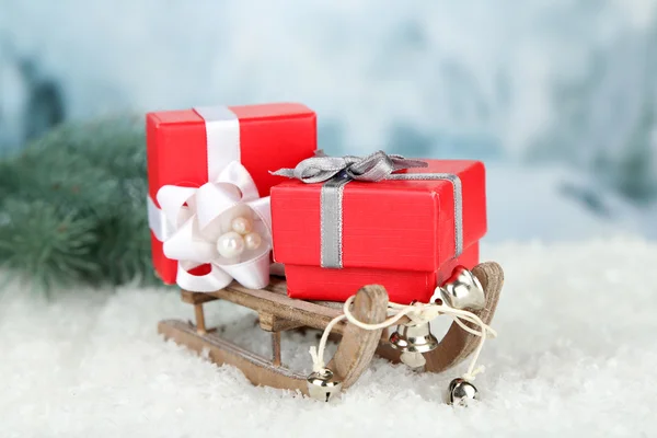 Toy sledge with Christmas gifts — Stock Photo, Image