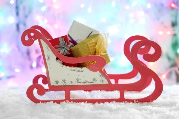 Toy sledge with Christmas gifts — Stock Photo, Image