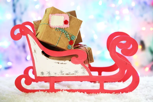 Toy sledge with Christmas gifts — Stock Photo, Image