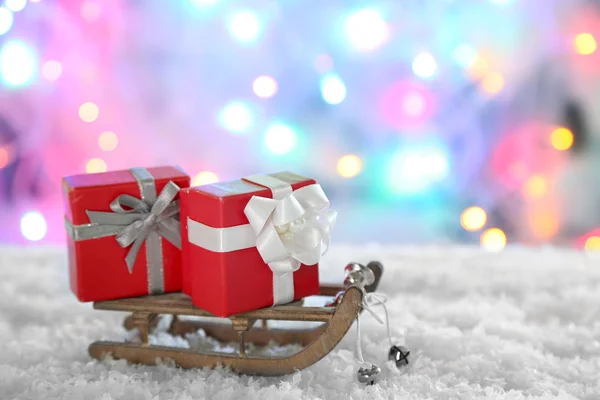 Toy sledge with Christmas gifts — Stock Photo, Image