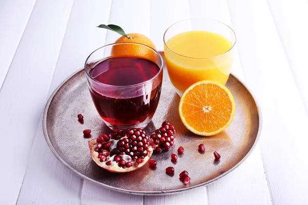 Apelsin och granatäpple juice — Stockfoto