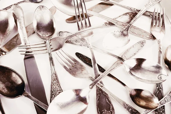 Old disordered tableware closeup — Stock Photo, Image