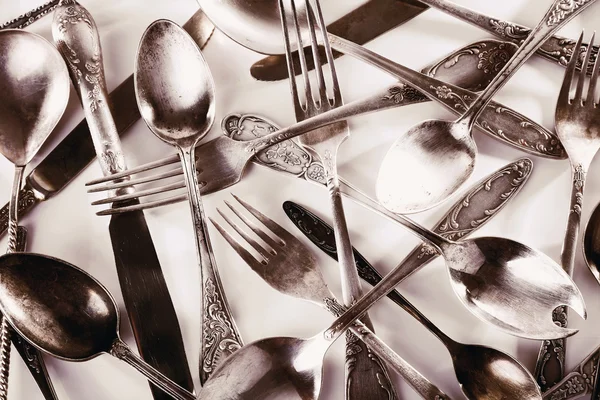 Old disordered tableware closeup — Stock Photo, Image