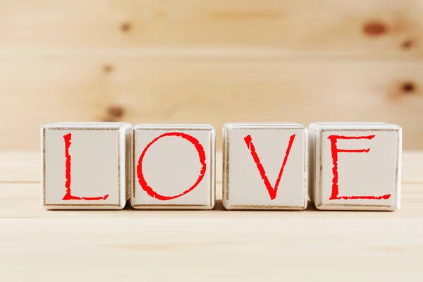 LOVE spelled in wooden blocks — Stock Photo, Image