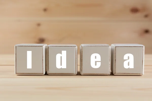 IDEA spelled in wooden blocks — Stock Photo, Image