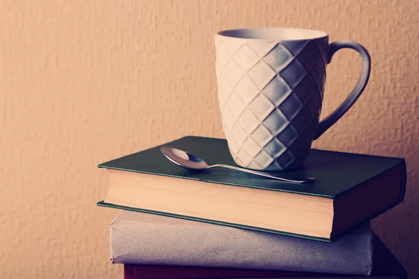 Old books and cup — Stock Photo, Image