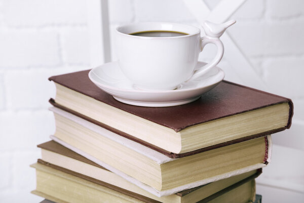 Books and cup of coffee
