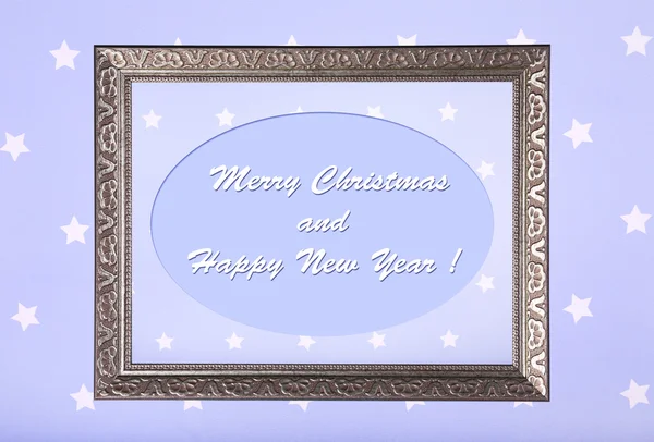 Christmas gratulationskort med ram på lila bakgrund — Stockfoto