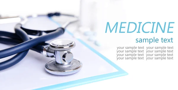 Stethoscope and other things on light background — Stock Photo, Image