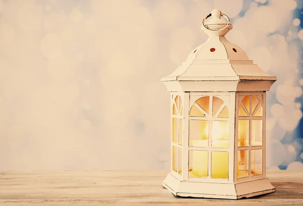 Lantern on wooden table — Stock Photo, Image