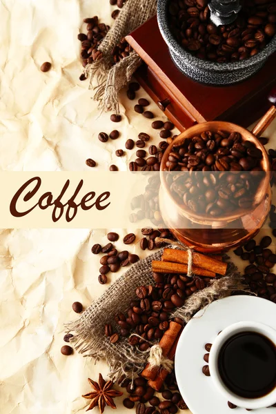 Cup of coffee, pot and grinder on beige background — Stock Photo, Image