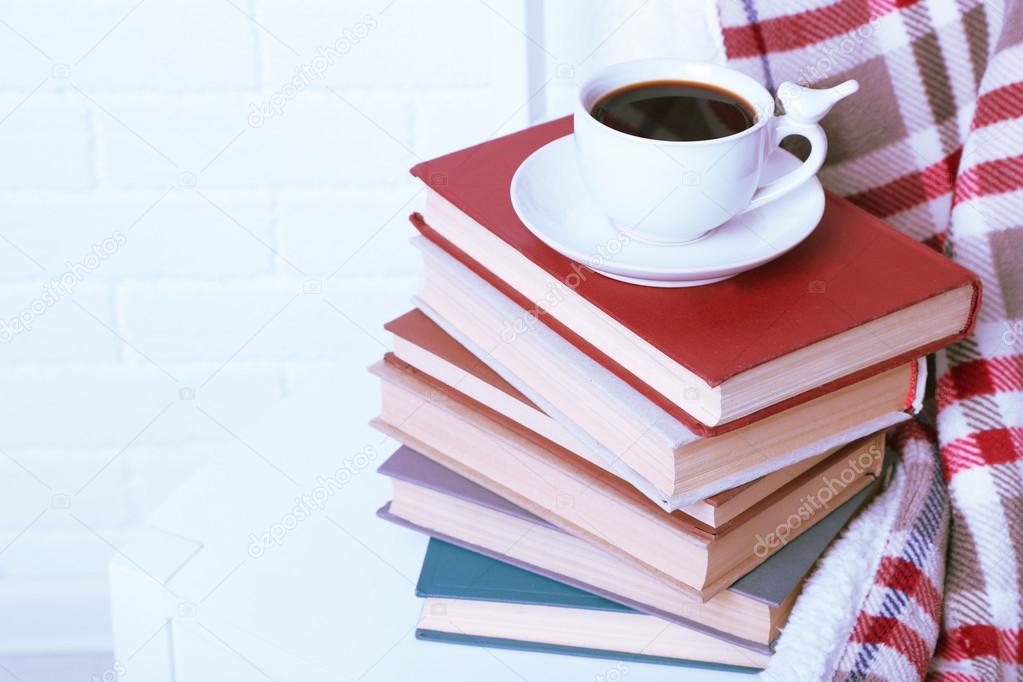 Books and cup of coffee