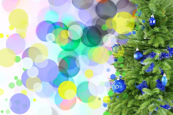 Decorated Christmas tree on festive shiny background — Stock Photo, Image