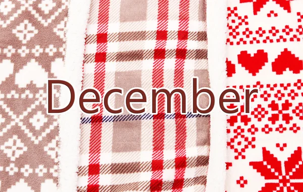 Szó December meleg plaids háttér — Stock Fotó