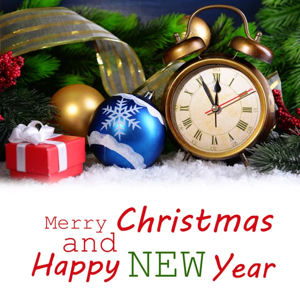 Alarm clock with Christmas decorations — Stock Photo, Image