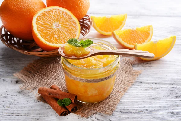 Delicious orange jam on table close-up — Stock Photo, Image